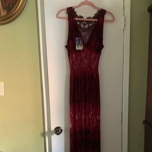 $Long dress,lace detailed with flowers at the top